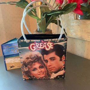 GREASE, recycled album cover tote. 2 plastic handles filled with beaded chain.